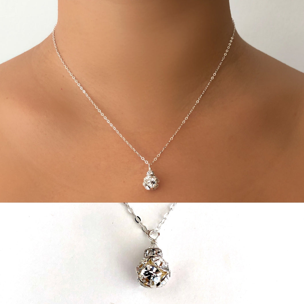 Sterling Silver Swarovski crystal rhinestone necklace made by hand.  Available in Sterling Silver or 14K gold fill.  Measures 16”  in length. Hypoallergenic.  Quality crafted to last using only high quality materials and closed jump rings. 
